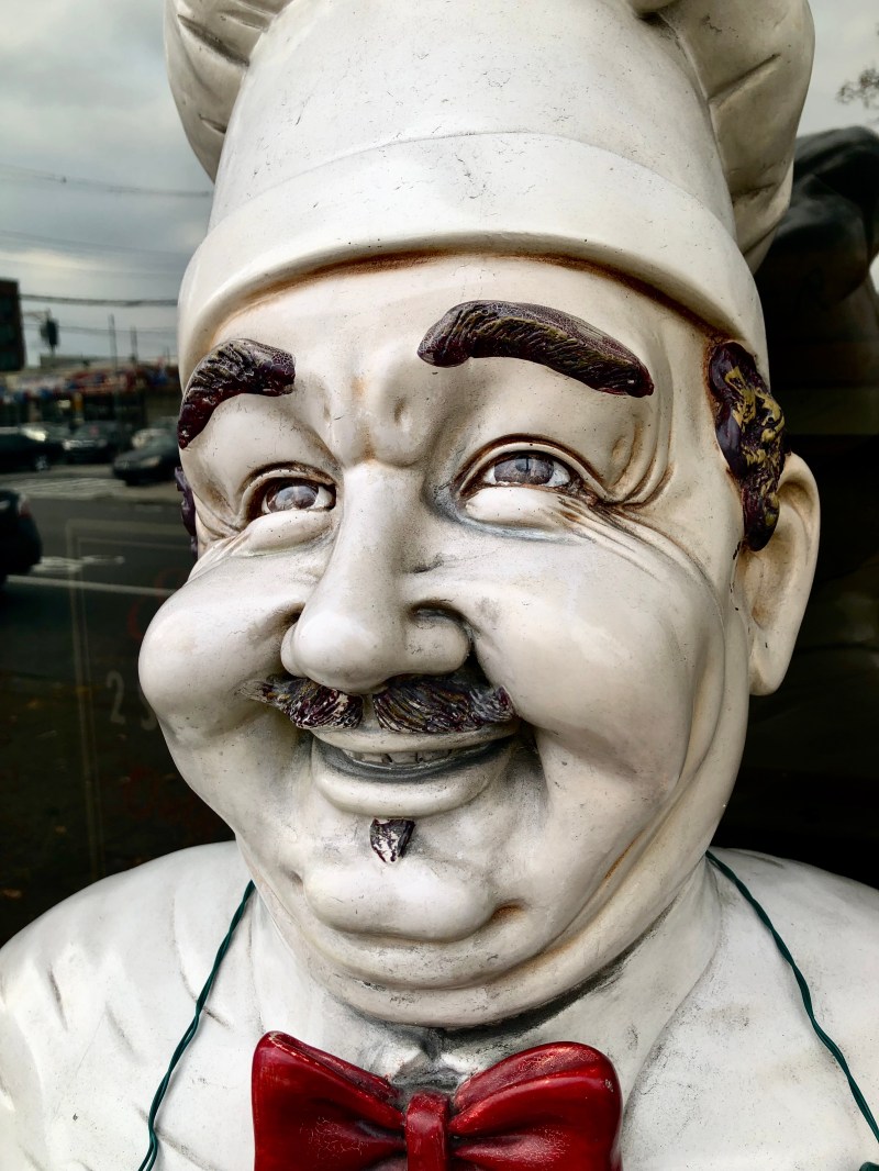 Paulie's Pizzeria mascot close up